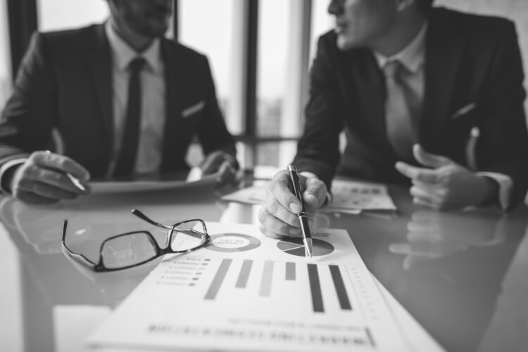 ProcurelyIQ-helps-lenders-business-brainstorming-graph-chart-report-data